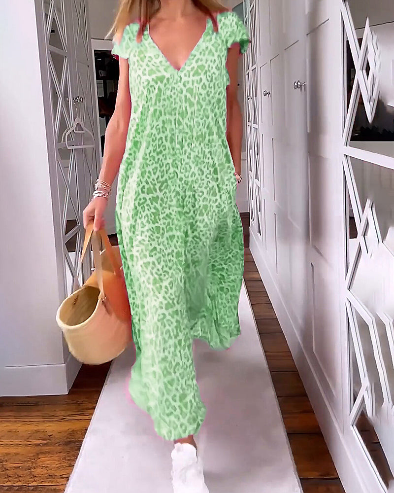 Mint green V-neck maxi dress with leopard print, ruffled cap sleeves and draped hem