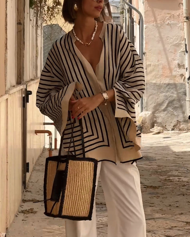 Clara™ elegant blouse, cream fabric with black geometric stripes, open V-neck, long sleeves