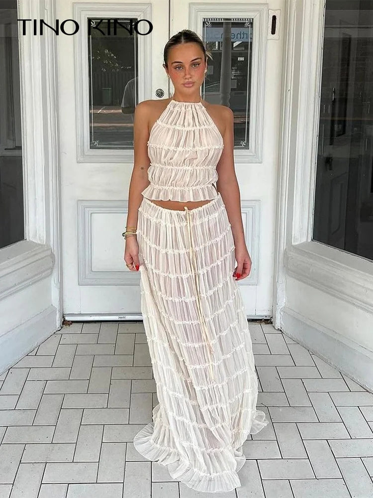 White halter tiered maxi skirt set with ruffled layers and smocked waist