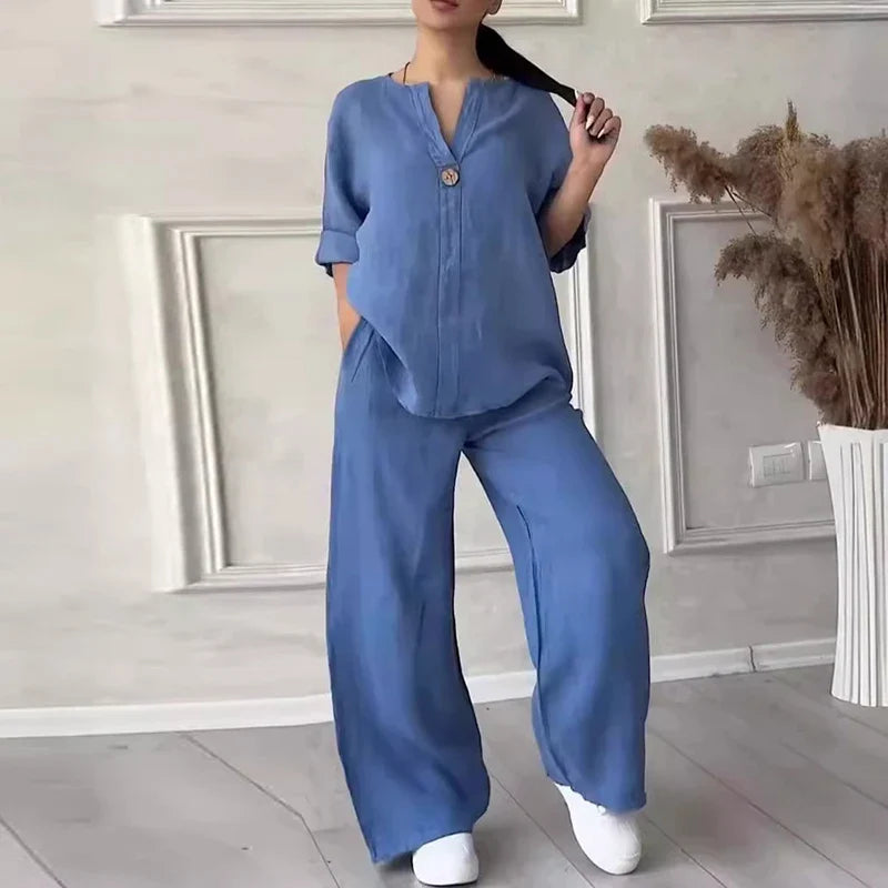 Blue linen lounge set with button-front short-sleeve top and wide-leg pants