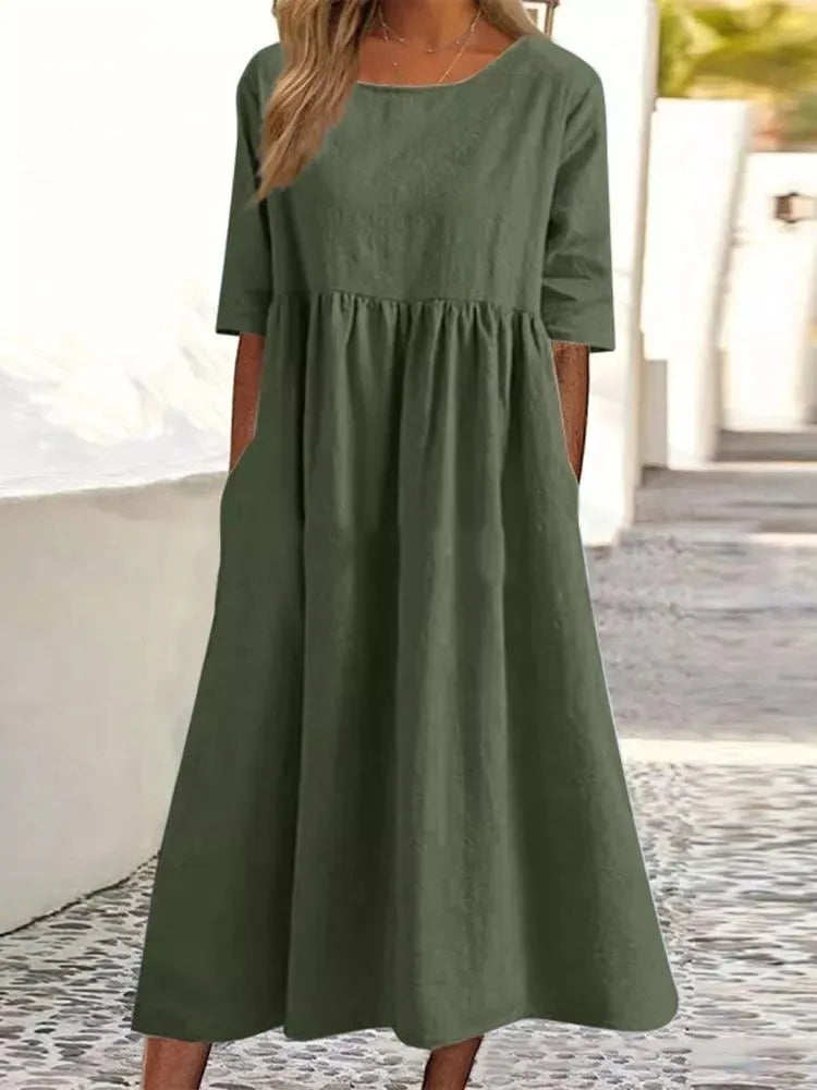 Norah™ summer dress in green, short sleeves, round neck, gathered waist, midi length