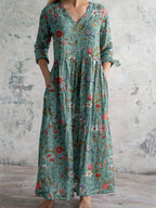Teal floral summer maxi dress with V-neck, three-quarter sleeves, gathered waist