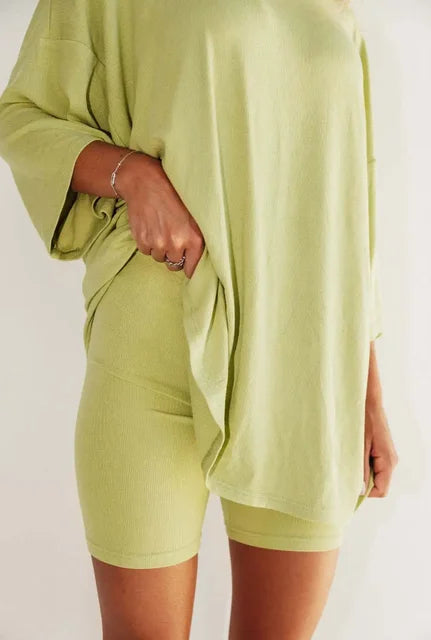 Women’s light yellow-green set with loose top and matching biker shorts.