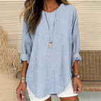 Blue striped linen tunic top with long sleeves, round neckline, curved hem