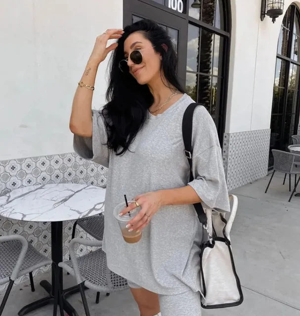 Light gray two-piece weekend set with loose T-shirt and matching shorts