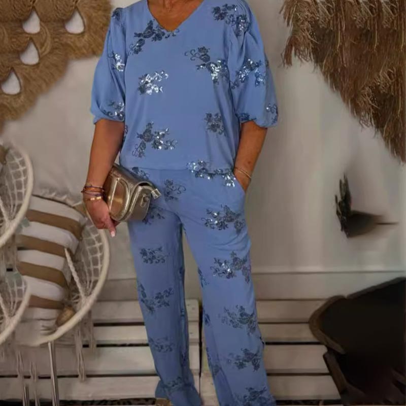 Lynn Comfortable set in powder blue with silver sequined floral details, V-neck blouse and trousers