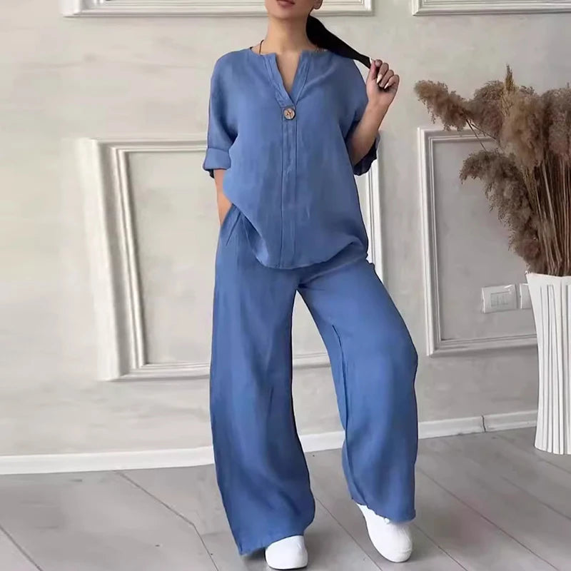 Blue linen set with short-sleeve button top and wide-leg pants