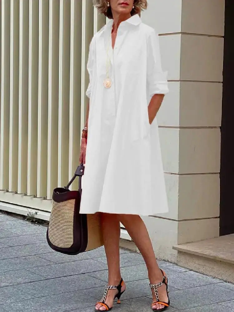 White button-front stylish dress with collar and long sleeves, knee length