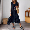 Black sleeveless midi dress with scoop neck and gathered A-line hem