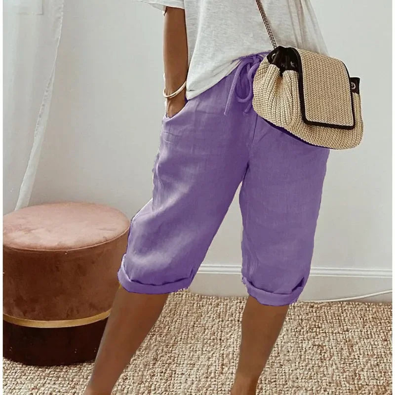 Purple cropped womens pants with drawstring waist and relaxed cuffed hem