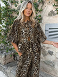 Leopard print top and drawstring pants set with bow tie neckline