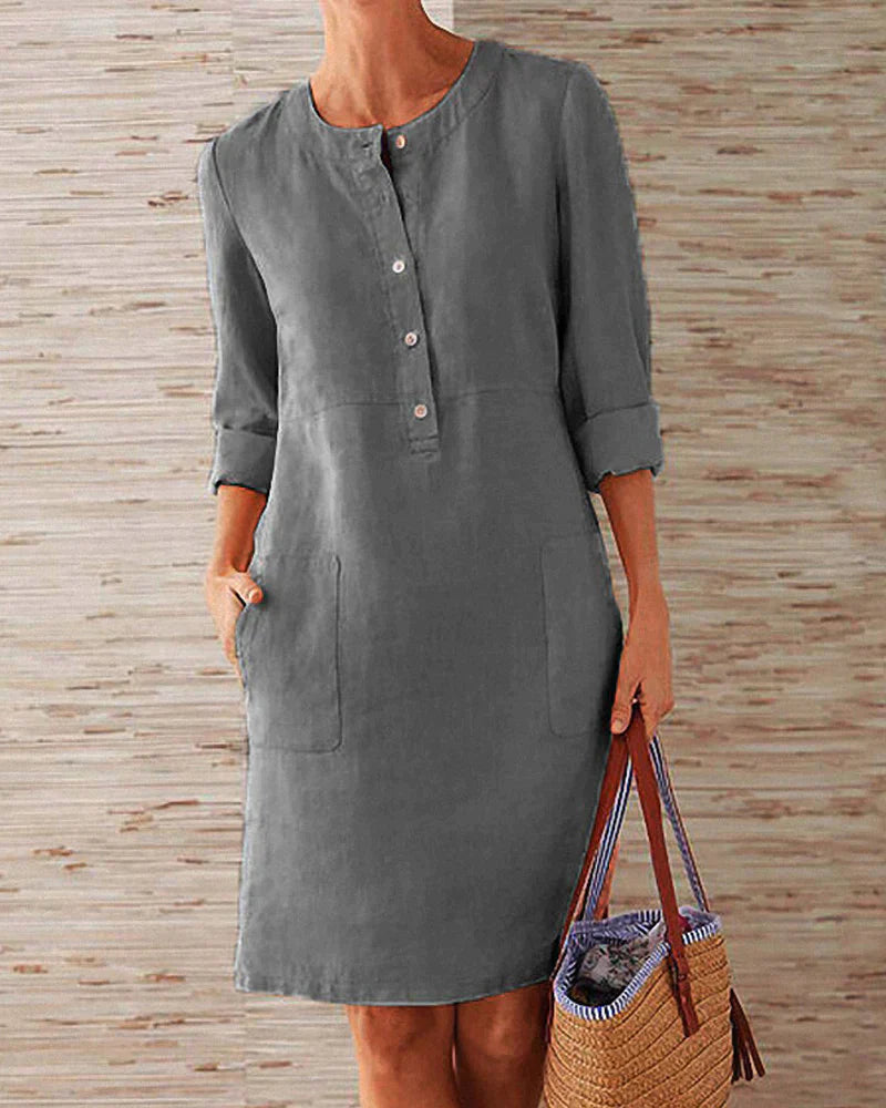 Charcoal gray button-front summer dress with three-quarter sleeves and side pockets