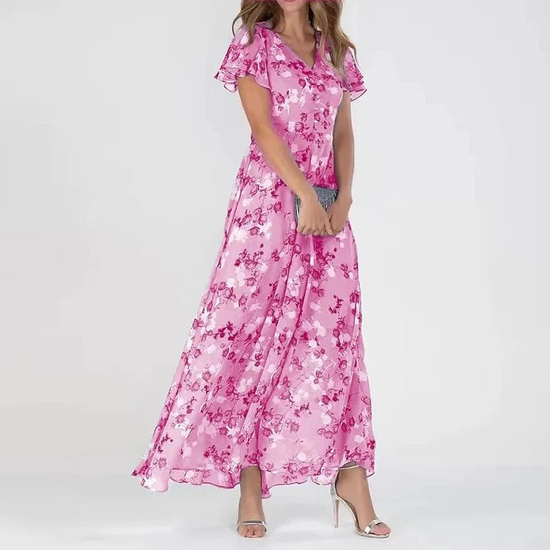 Pink floral summer dress with short flutter sleeves and V-neck, tiered maxi skirt