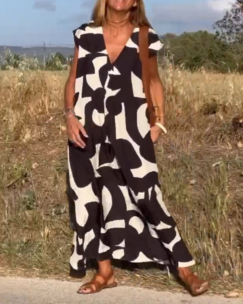 Black and white printed V-neck cap-sleeve maxi dress