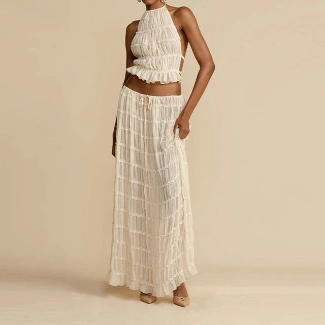 White halter crop top with tiered ruffles and matching maxi skirt set