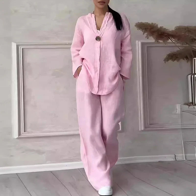 Pink linen lounge set with button-front short-sleeve top and wide-leg pants