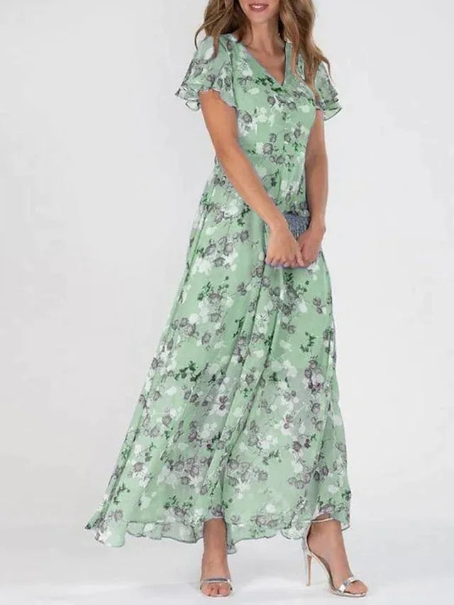 Green floral summer dress with short flutter sleeves and V-neck, gathered tiered skirt
