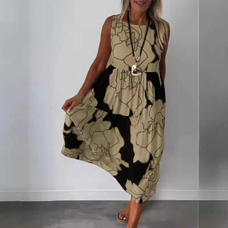 Sleeveless printed midi dress with round neckline and flowing tiered skirt, light olive.