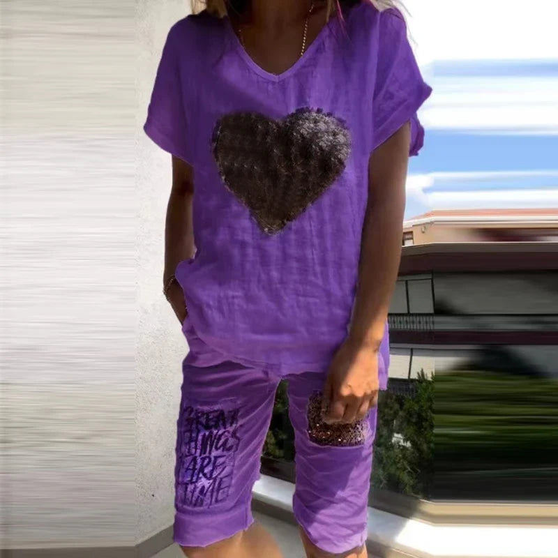 Purple V-neck T-shirt and shorts set with dark heart and text print