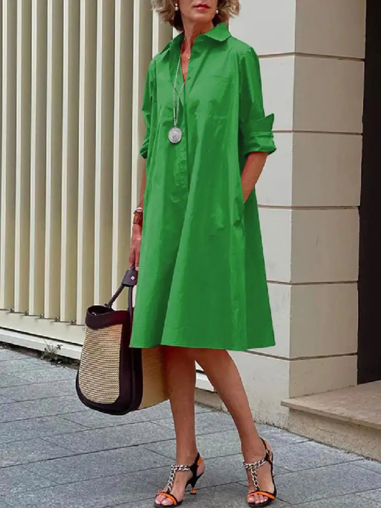 Green button-front stylish dress with collar and long sleeves, knee length