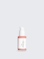 Rose-toned serum bottle with pump and logo print