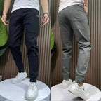 Men's gray casual pants with zip fly, tapered fit, front and back pockets