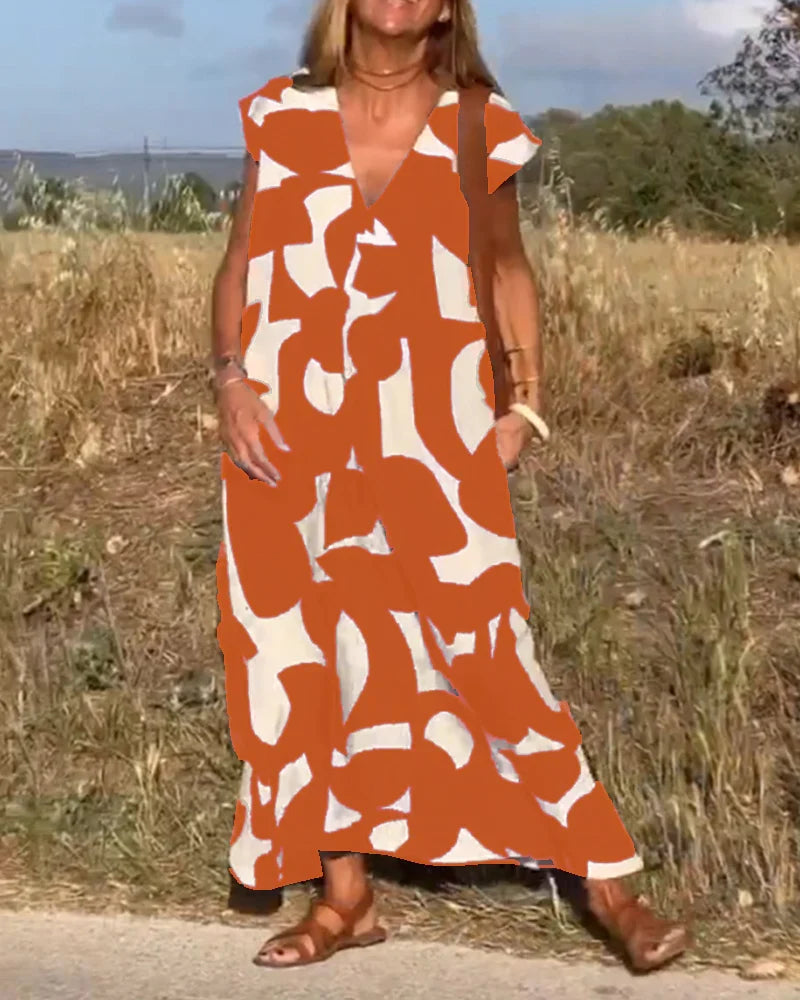 Orange and white printed V-neck cap-sleeve maxi dress