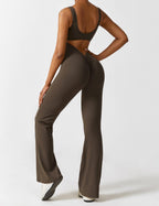 Brown open-back flared jumpsuit with diagonal back cutout