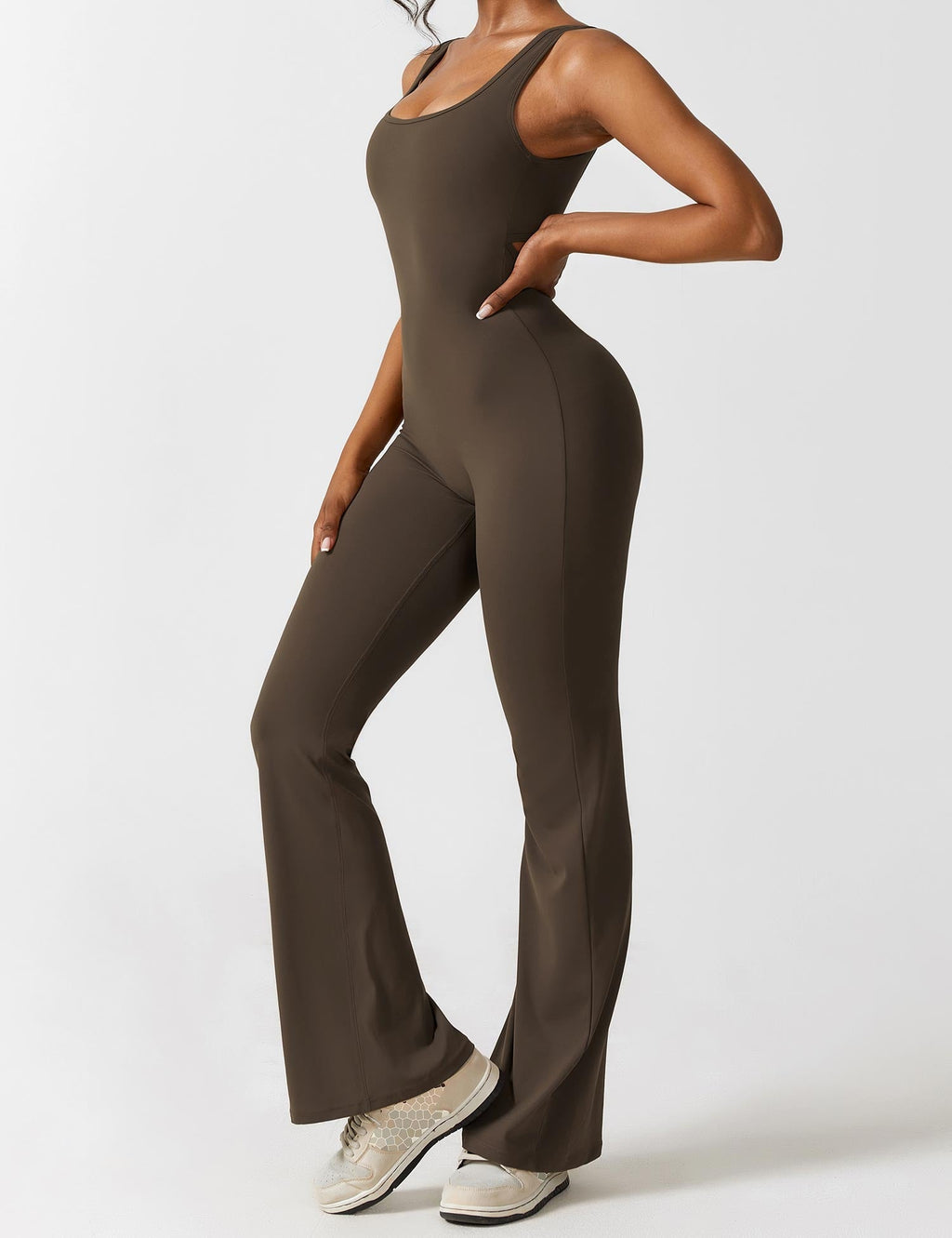 Black flared-leg sports jumpsuit with scoop neckline, sleeveless fit