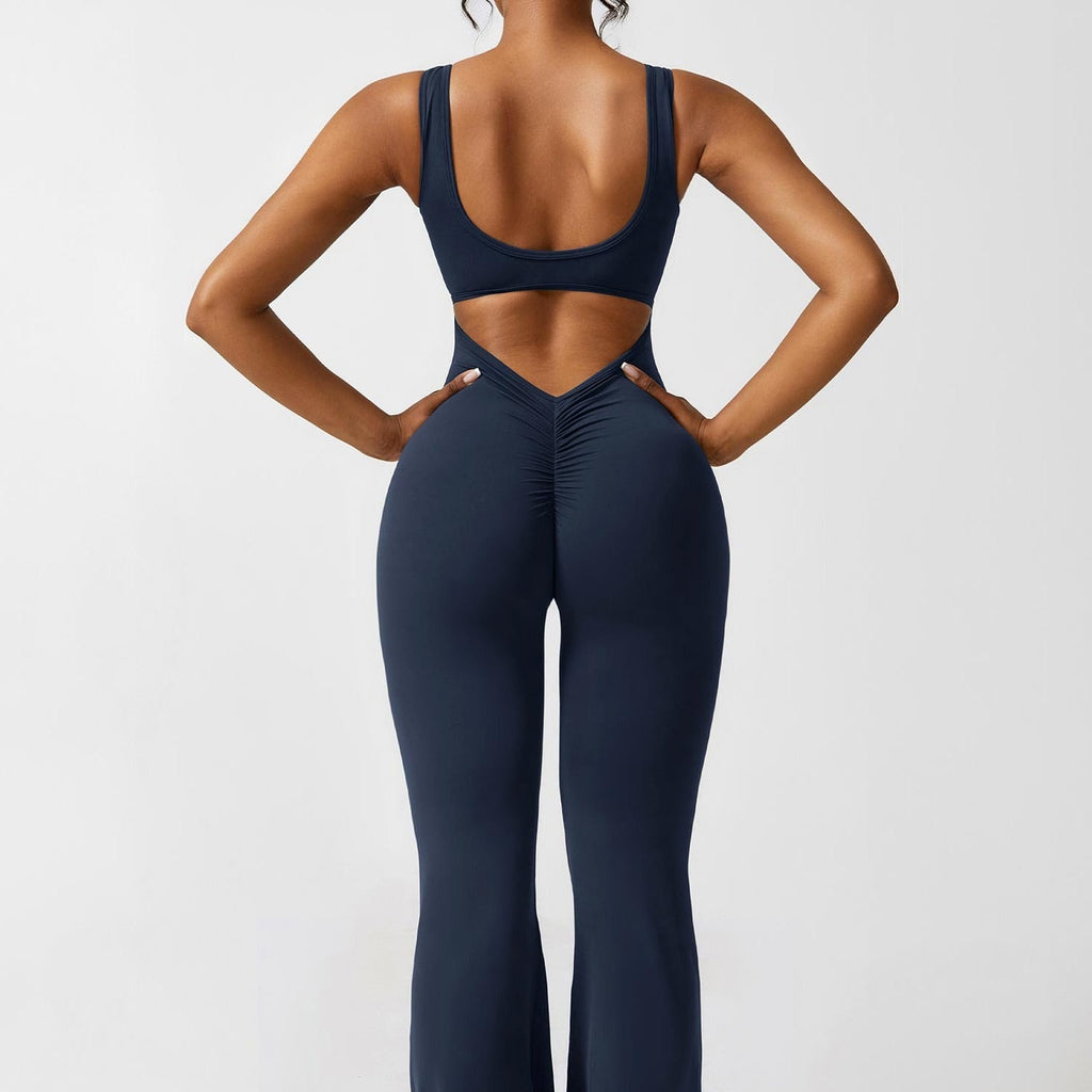 Navy open-back flared jumpsuit with ruched V-back