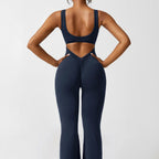 Navy open-back flared jumpsuit with ruched V-back
