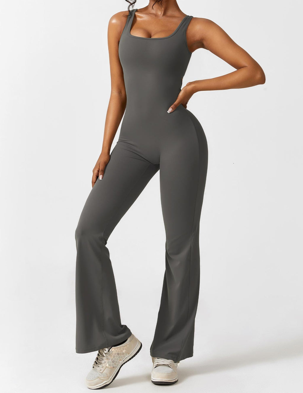 Athletic dark gray jumpsuit with sleeveless scoop neck and wide flared legs.